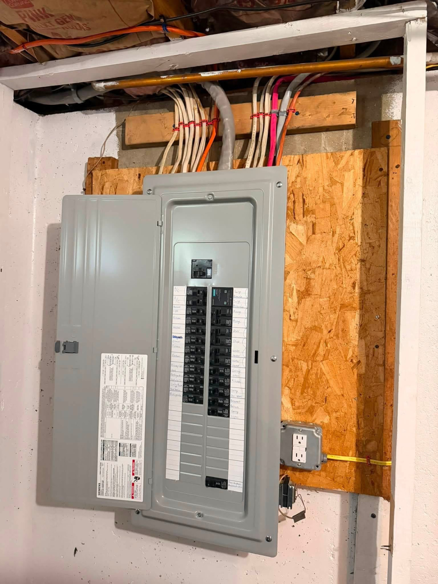 New labeled breaker panel installed during a residential service upgrade